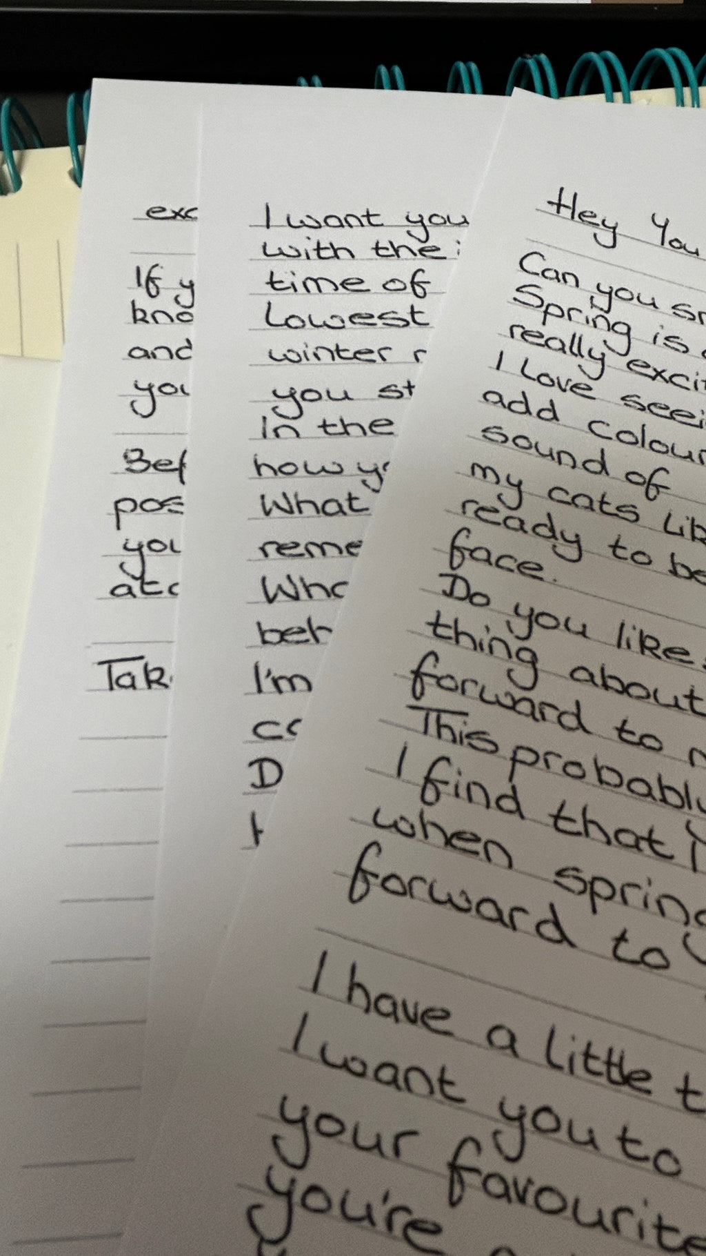 Handwritten notes on lined paper with text.