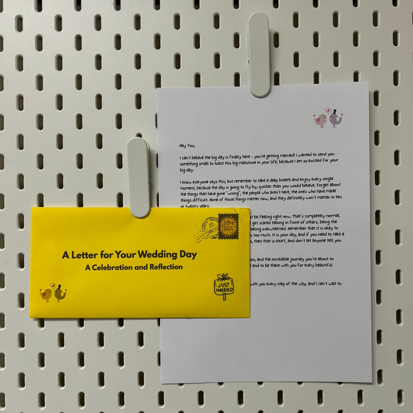 Letter for Your Wedding Day on a pegboard with a yellow card.