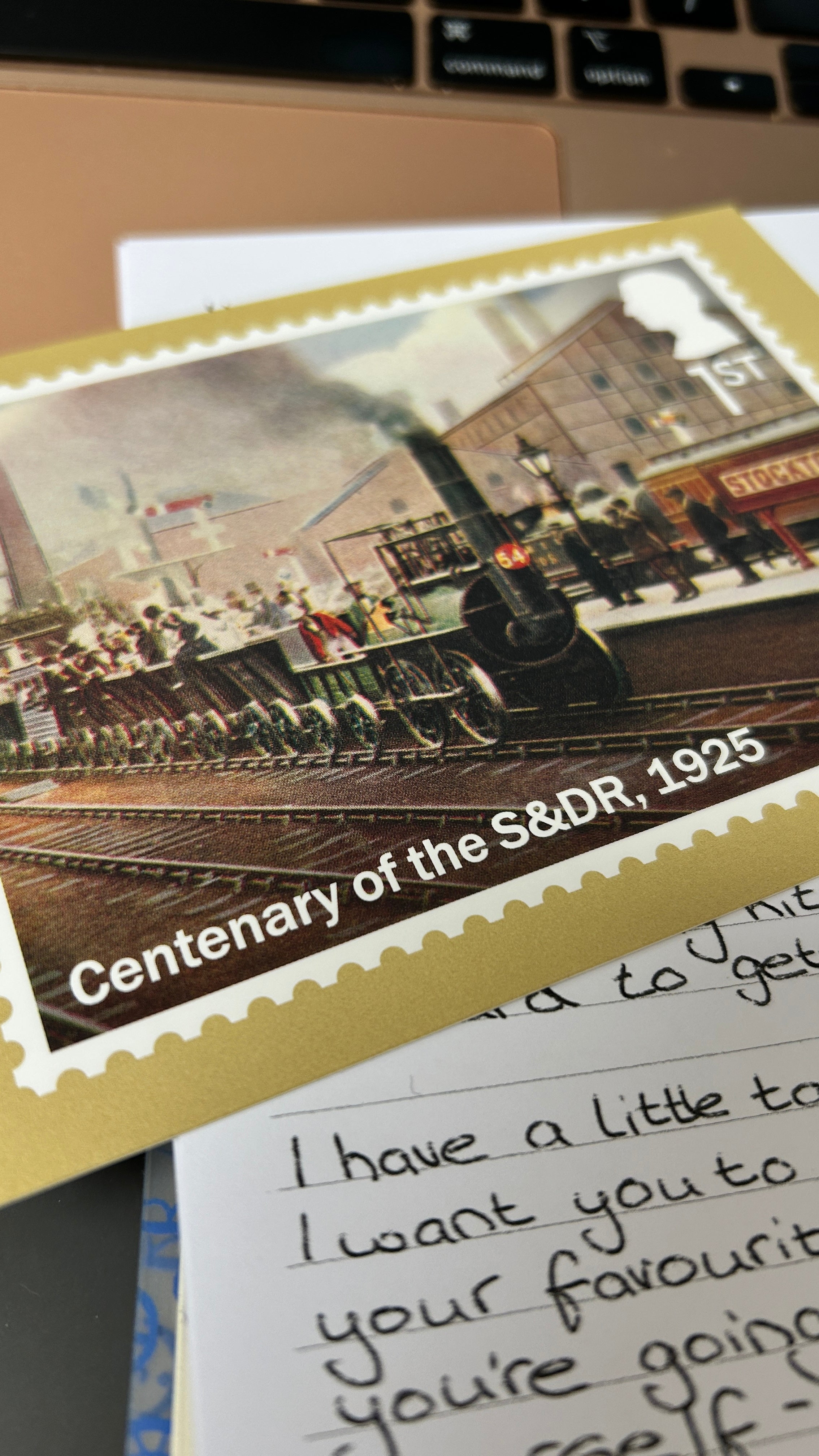 Vintage-style postcard with a train scene and text 'Centenary of the S&DR, 1925' on top of a handwritten letter.